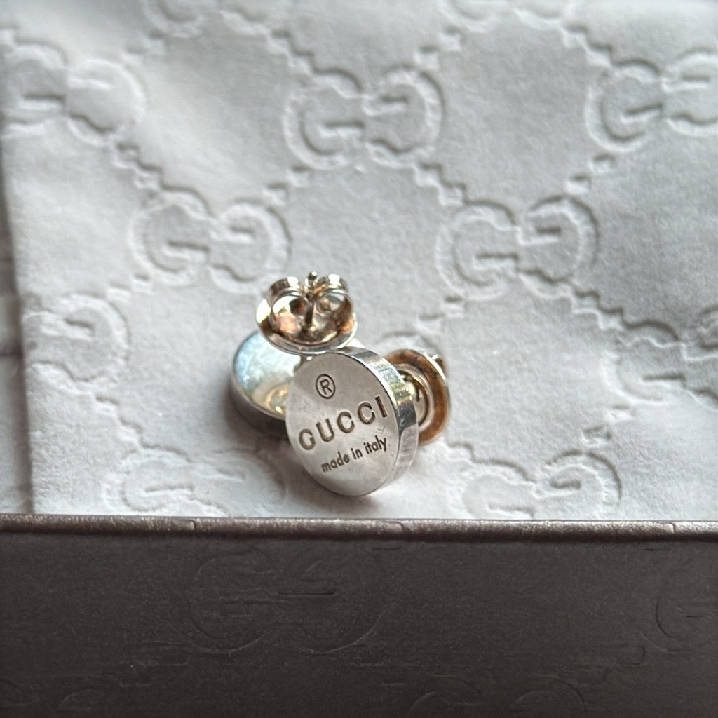 Gucci Shimmering Silver Logo Earrings